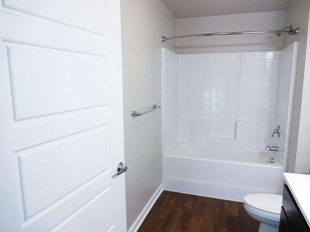 Full-size bathroom in October Station apartment building