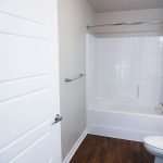 Full-size bathroom in October Station apartment building