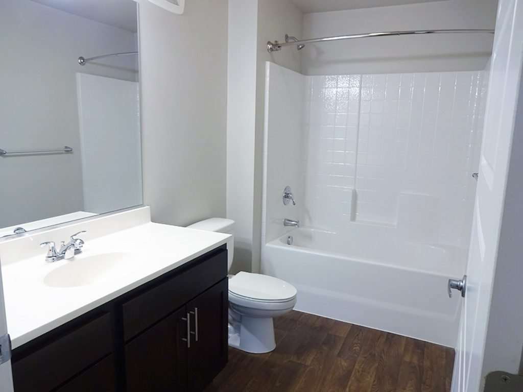 Full-size bathroom in October Station apartment building