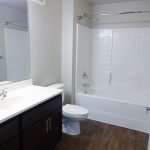 Full-size bathroom in October Station apartment building